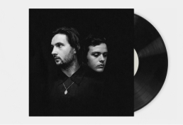 Graphic design services showcasing a minimalist black and white portrait album cover of two men in a dark space with vinyl.