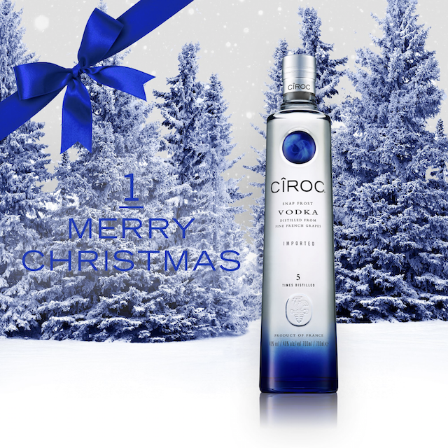 Ciroc Vodka Bottle On Christmas Themed Background Merry Christmas With Snow Blue Bow And Trees