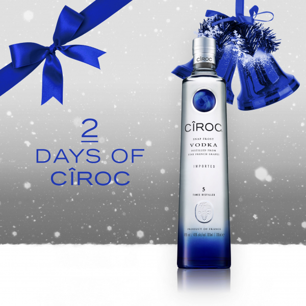 Ciroc Vodka Bottle On Christmas Themed Background 2 Day Countdown With Snow Blue Bow And Bells Graphics