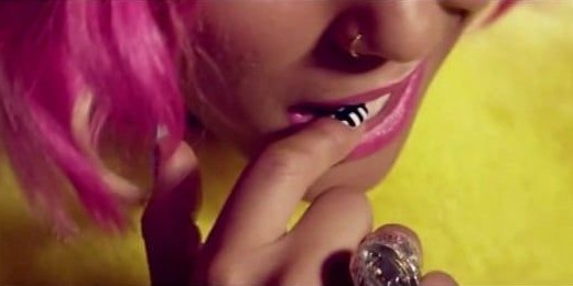 Beautiful Female Singer With Pink Hair Crystal Rings Biting Nail