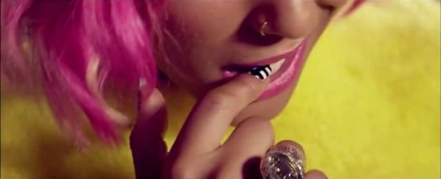 Beautiful Female Singer With Pink Hair Crystal Rings Biting Nail