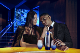 High fashion photography campaign featuring creative direction and professional retouching of models drinking at a London club bar.