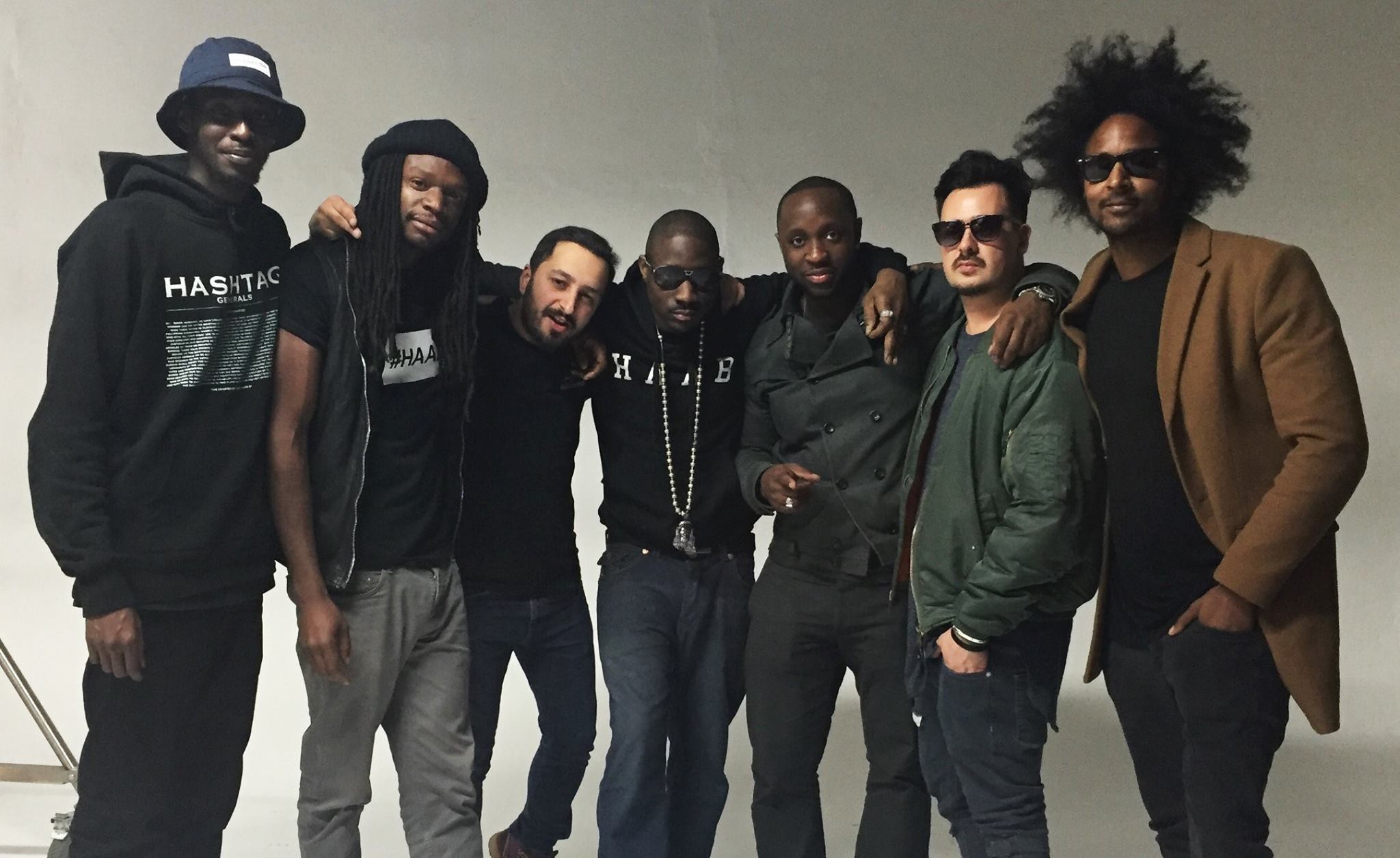 Professional Photography Group Of Men Standing Arms Around Shoulders For Photo