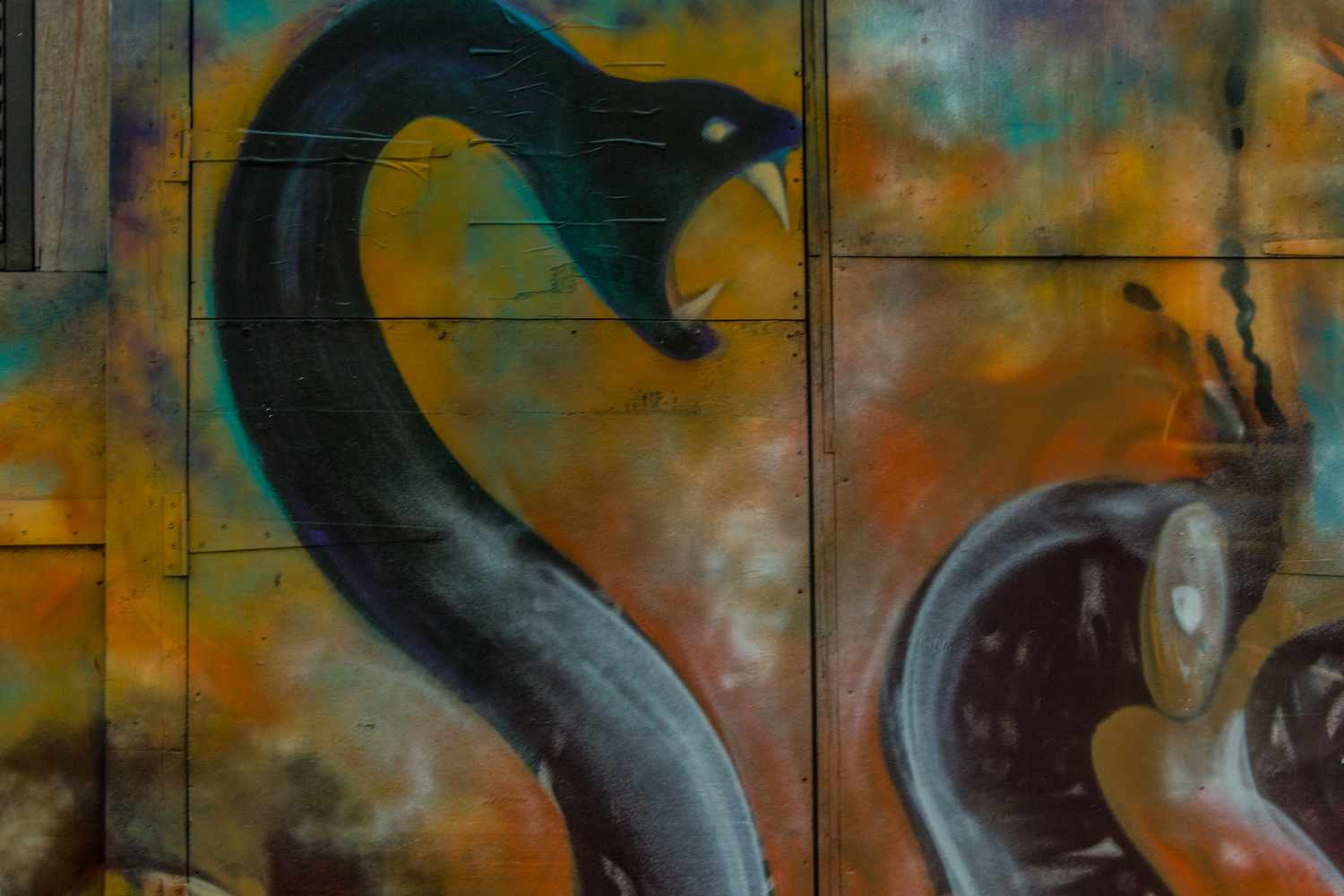 Professional Photography Graffiti Mural Of Snakes On Wall In Brick Lane East London