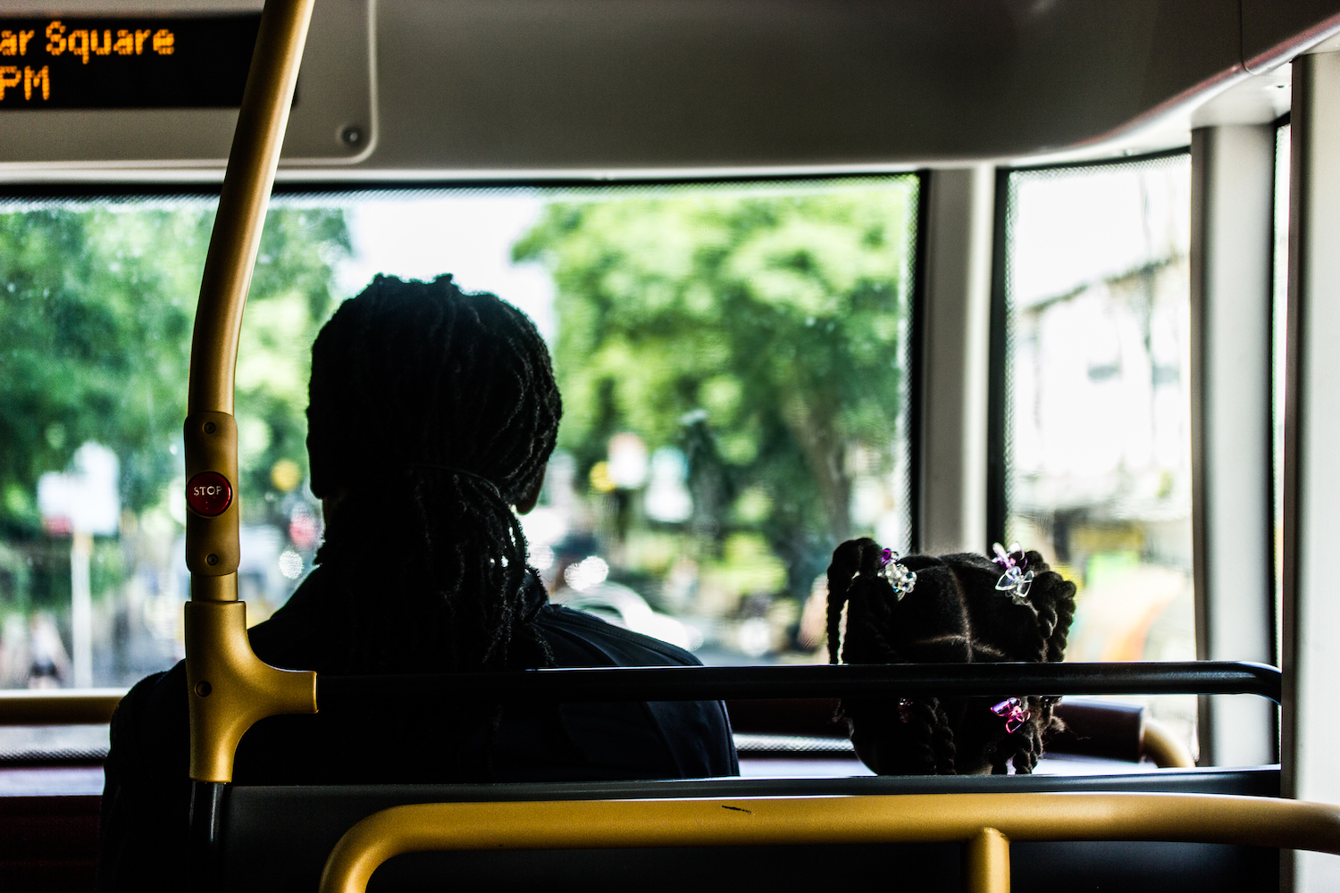 Professional Photography Black Man And Daughter Sitting On Top Level Of Bus In Brixton South London