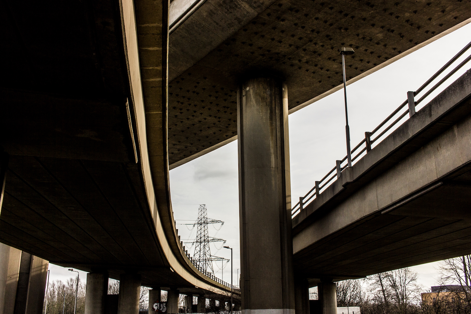 Professional Photography Concrete Roundabout In South Woodford North East London With Three Overpasses One Pillar And Electrical Tower