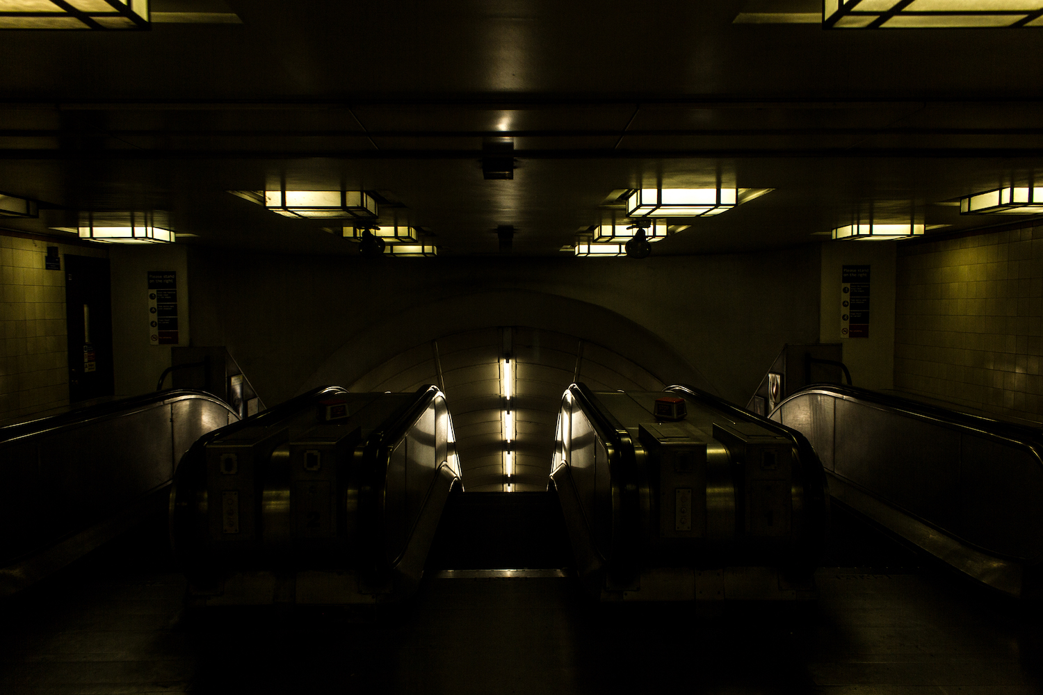 Professional Photography Interior Escalators With Fluorescent Light In Gants Hill Train Station London