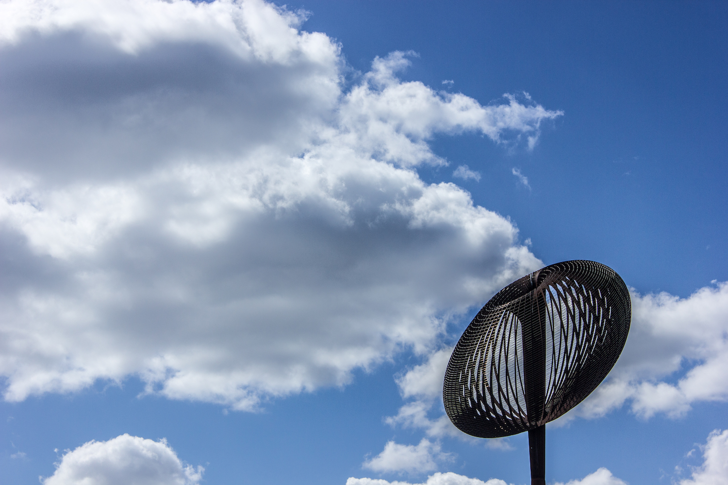 Professional Photography Egg Whisk Sculpture With Blue Sky And Clouds In Gants Hill London