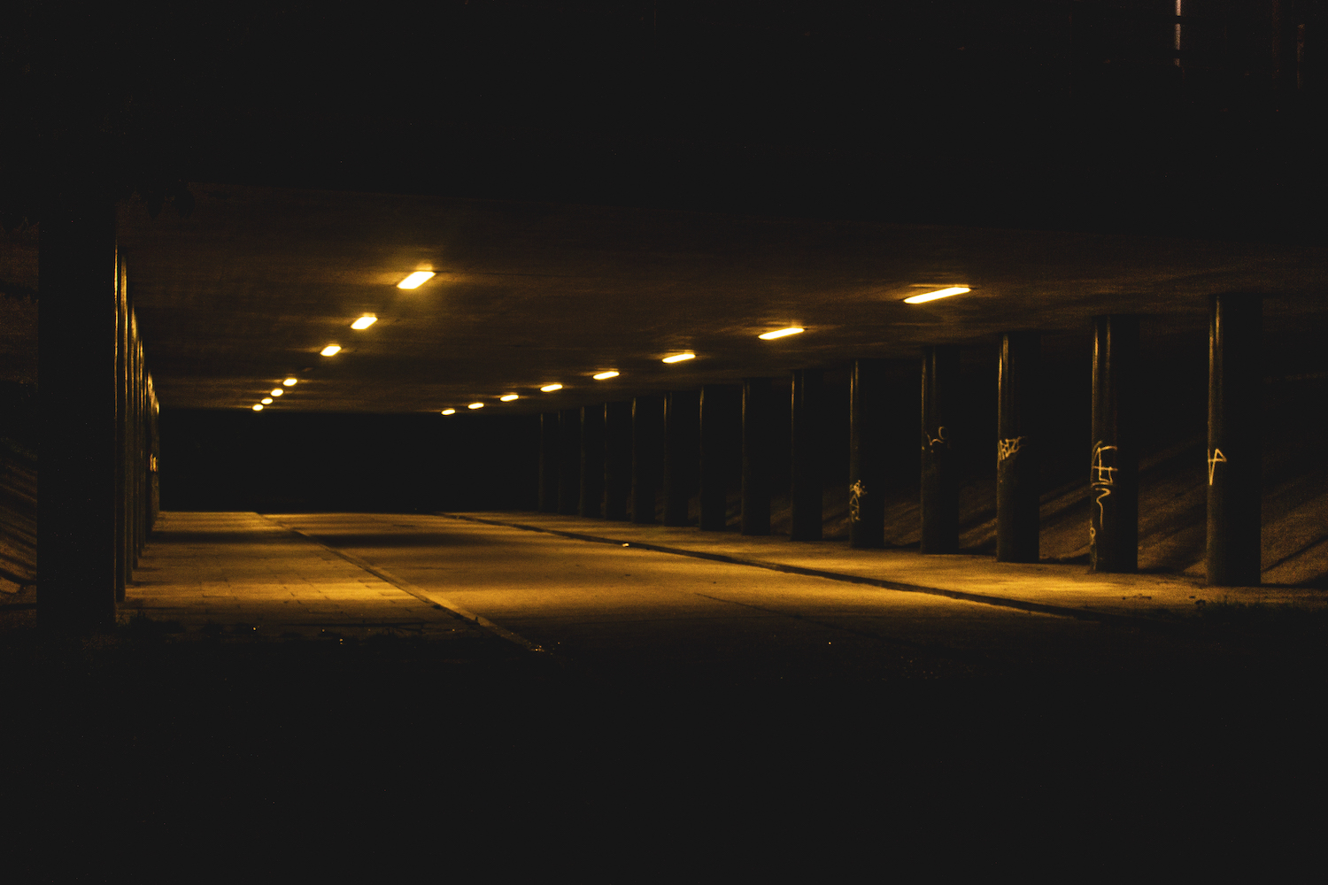 Professional Photography Motorway Underpass At Night With Shadows And Dark Pillars In Redbridge East London