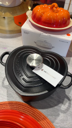 an image of a black autumn themed Le Creuset pot and dish in Braintree Outlet Village